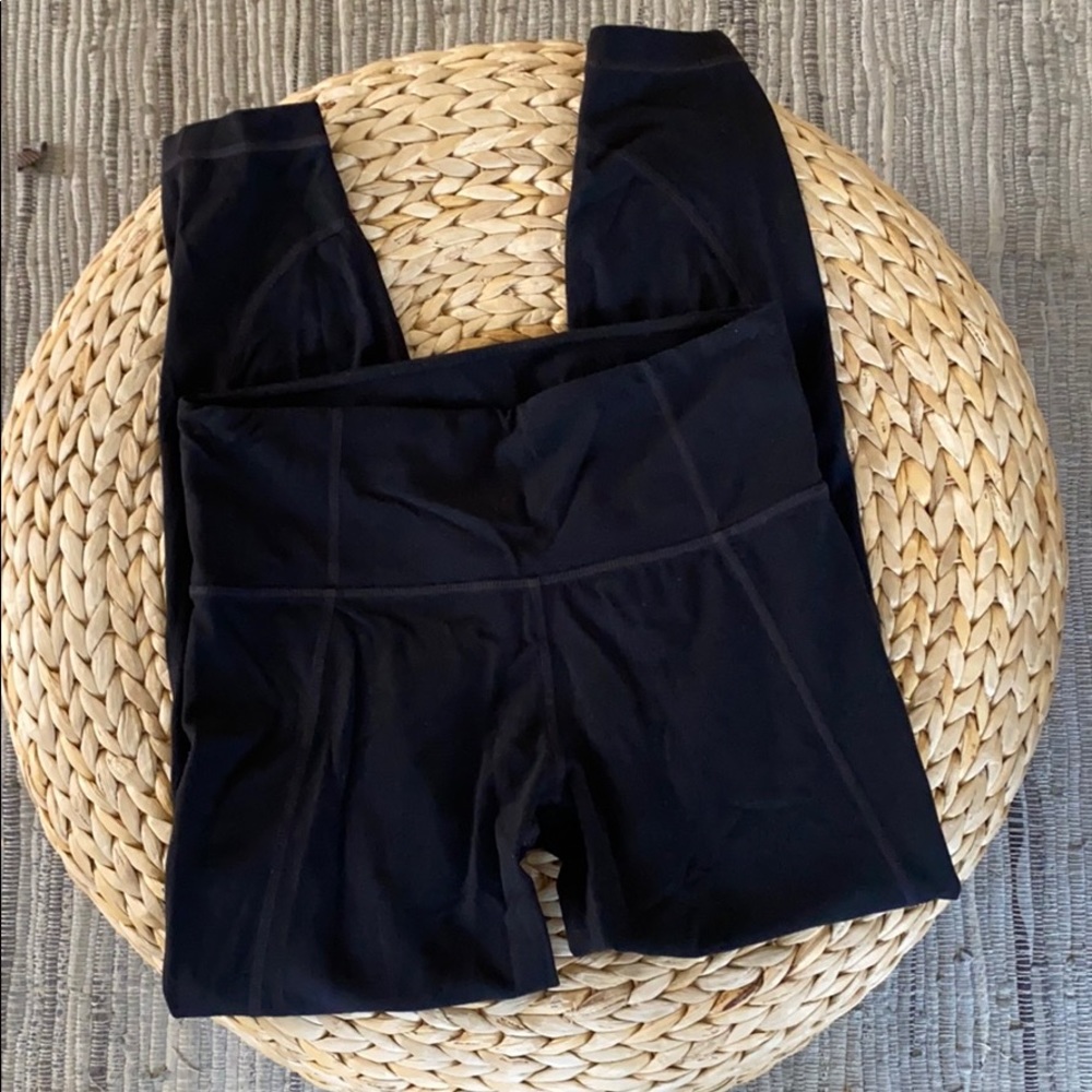 Athleta black leggings in 7/8. Size Small